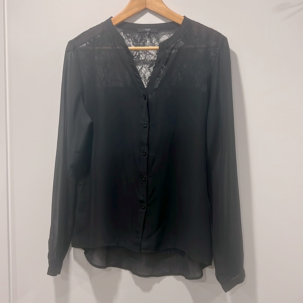 Sheer black blouse with lace shoulders
